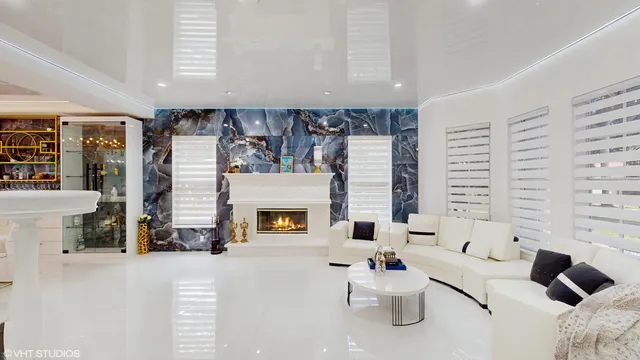 a front view of a house with a yard table and chairs