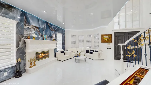 a living room with furniture and a rug