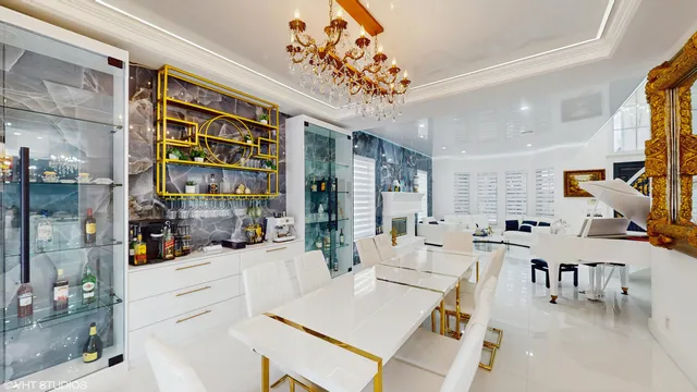 a living room with furniture and a clock