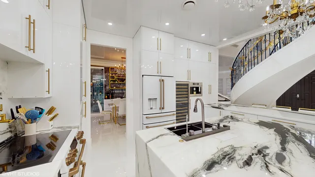 a view of a house with swimming pool and sitting area