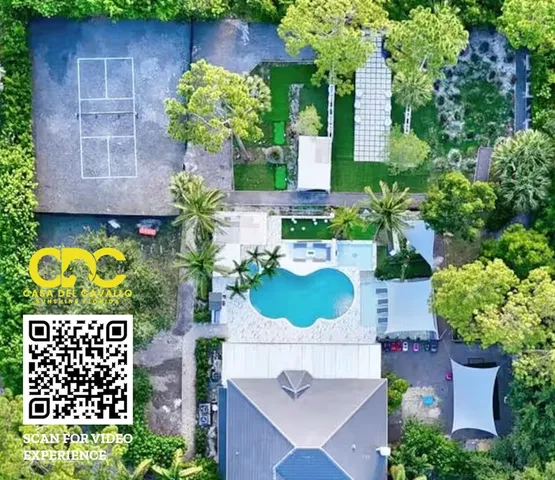 a living room with furniture fireplace and rug