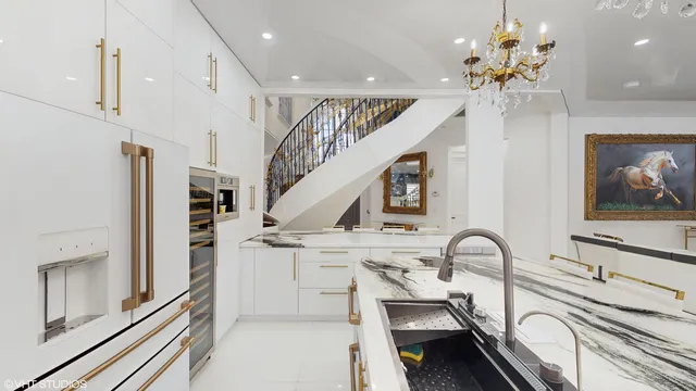 a room with lots of furniture and white walls