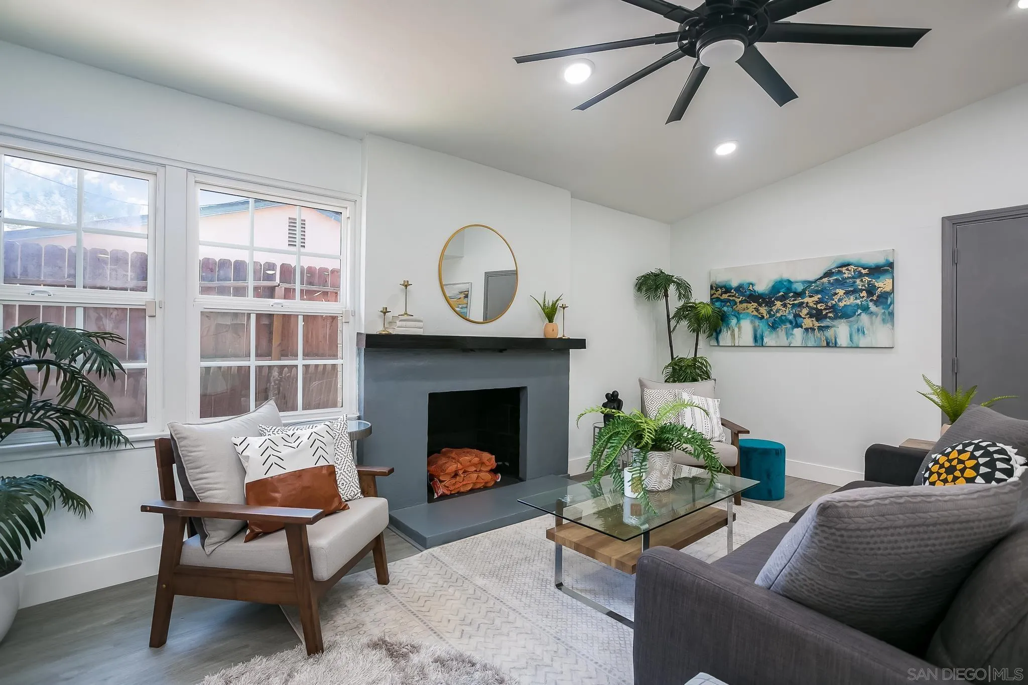 12221 Witt Road Poway, CA 92064 - Photo 1 of 30 a living room with furniture and a fireplace