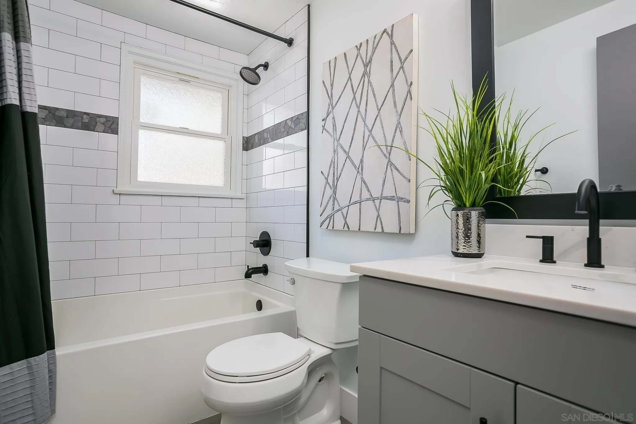 12221 Witt Road Poway, CA 92064 - Photo 14 of 30 a bathroom with a sink a toilet a window and shower