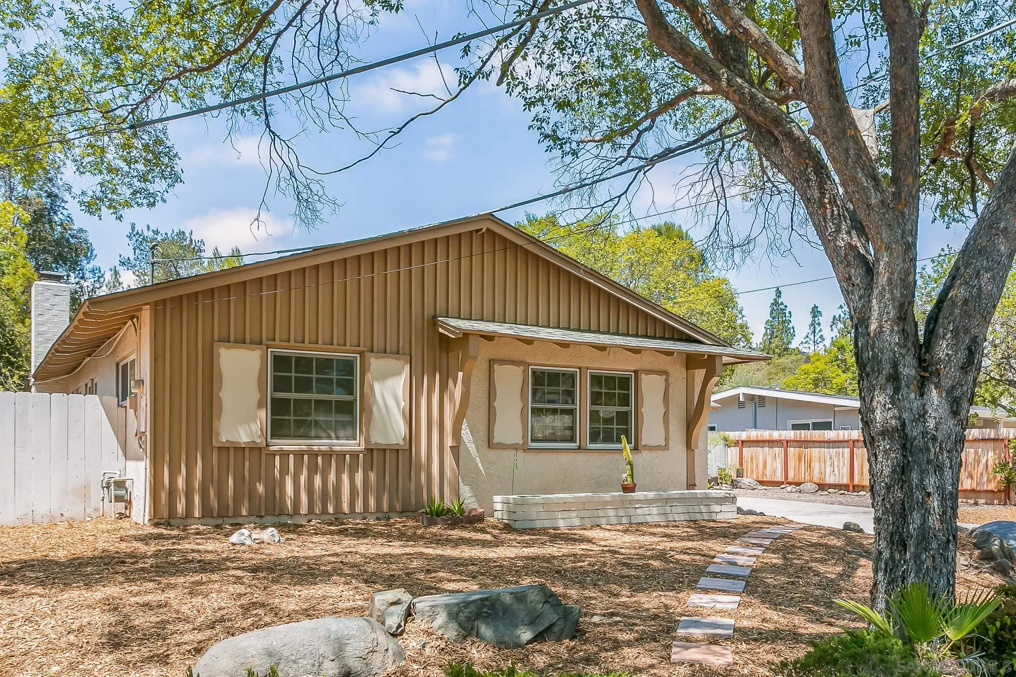 12221 Witt Road Poway, CA 92064 - Photo 25 of 30 a front view of a house with a garage