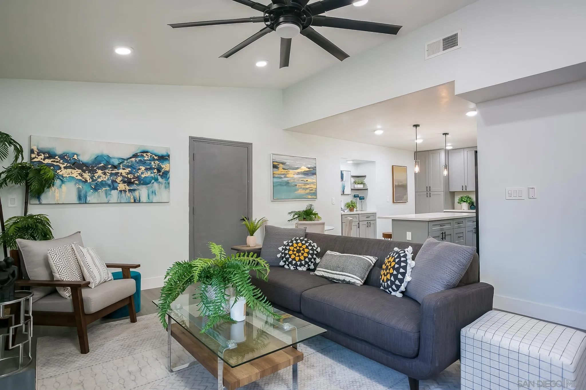 12221 Witt Road Poway, CA 92064 - Photo 5 of 30 a living room with furniture and a chandelier