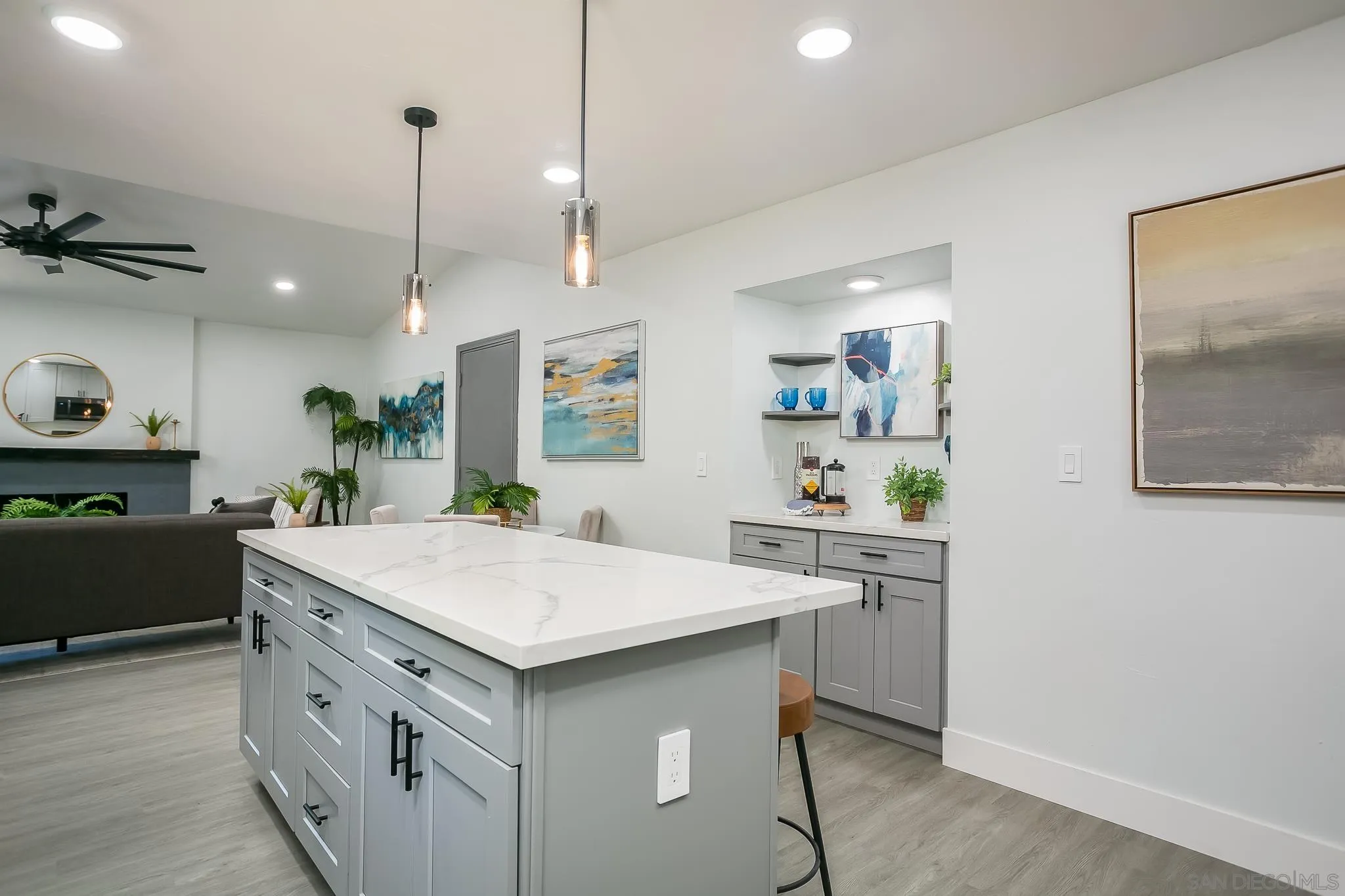 12221 Witt Road Poway, CA 92064 - Photo 6 of 30 a kitchen that has a sink a stove and chairs