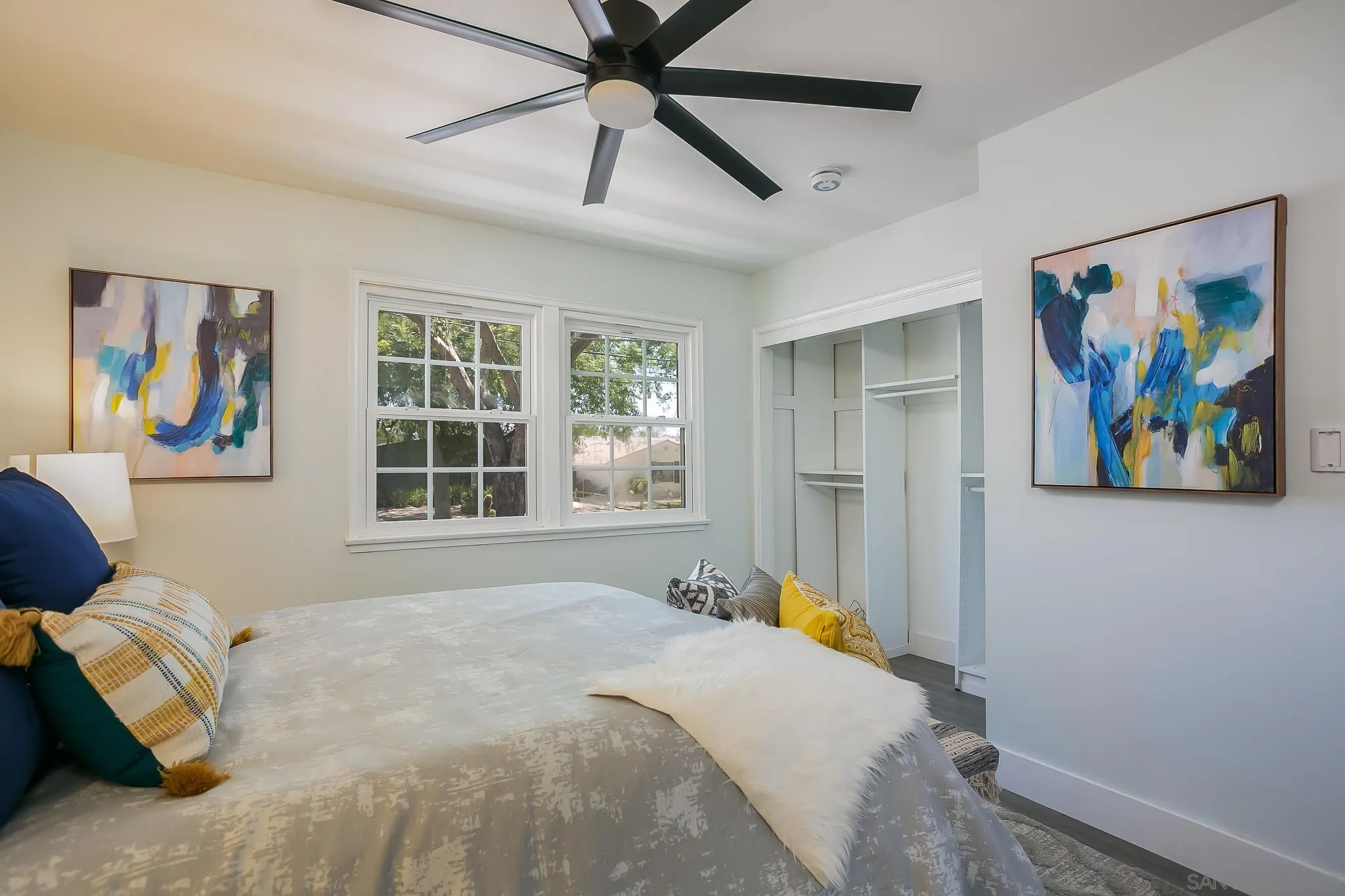 12221 Witt Road Poway, CA 92064 - Photo 9 of 30 a bedroom with a bed and glass window