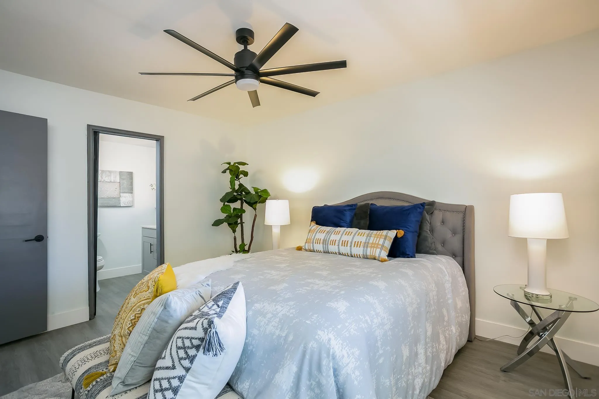 12221 Witt Road Poway, CA 92064 - Photo 10 of 30 a bedroom with a bed and painting on the wall