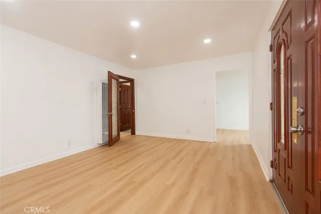 an empty room with windows