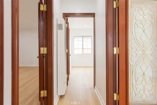 a view of an empty room and window