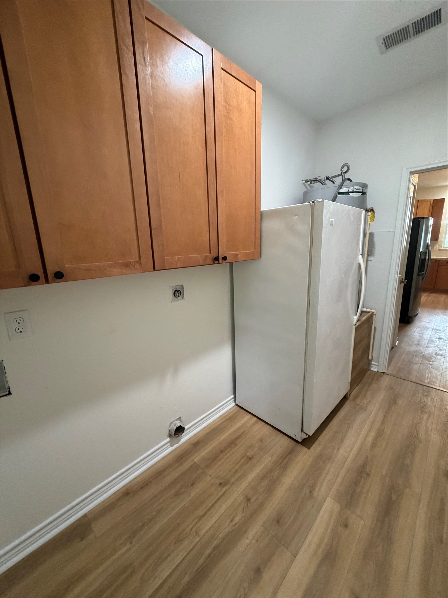11 Lords Circle Coldspring, TX 77331 - Photo 10 of 27 Laundry room with updated flooring