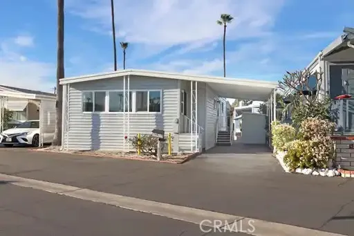 a view of a house with a street
