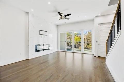 223 16th Street Northwest, Unit 8 Atlanta, GA 30363 - Photo 17 of 43 an empty room with wooden floor and windows