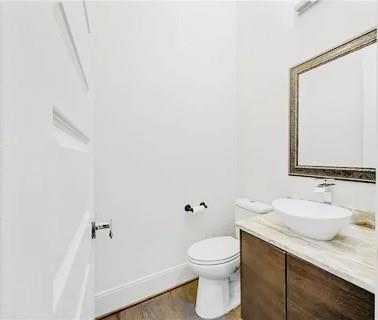 223 16th Street Northwest, Unit 8 Atlanta, GA 30363 - Photo 19 of 43 a bathroom with a granite countertop sink toilet and mirror