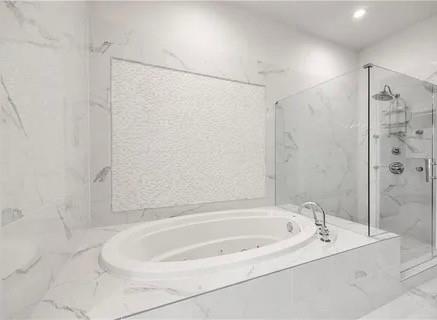 223 16th Street Northwest, Unit 8 Atlanta, GA 30363 - Photo 28 of 43 a bathroom with a bathtub and shower