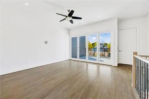 223 16th Street Northwest, Unit 8 Atlanta, GA 30363 - Photo 32 of 43 wooden floor in an empty room with a window