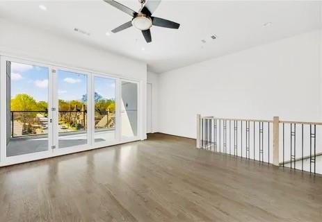 223 16th Street Northwest, Unit 8 Atlanta, GA 30363 - Photo 33 of 43 wooden floor in an empty room with a window