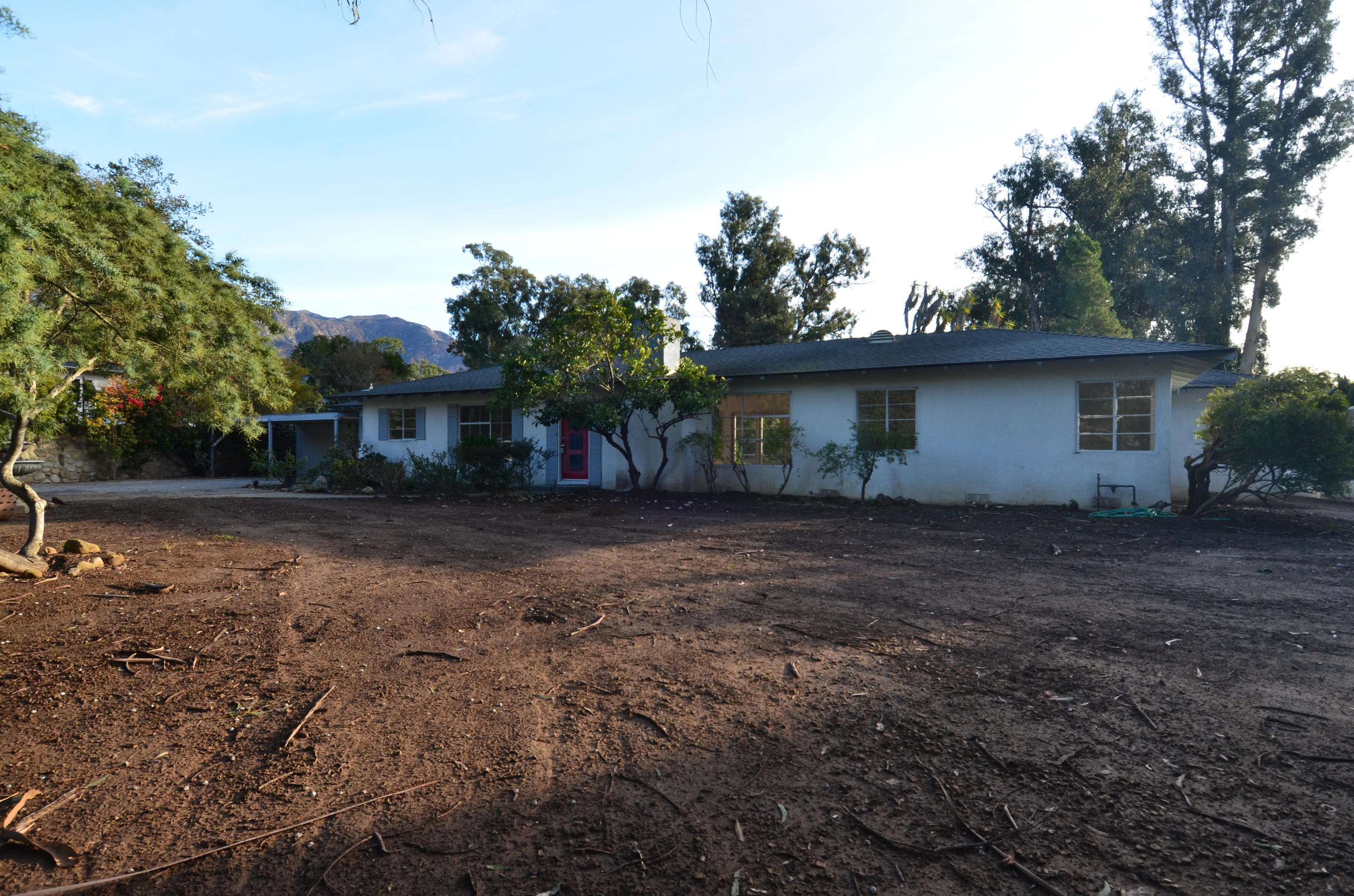 1409 School House Road Montecito, CA 93108 - Photo 4 of 5 a view of a house with backyard and garden