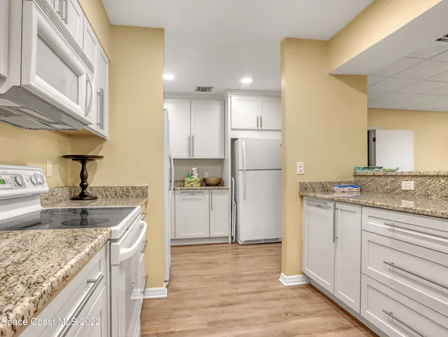 a view of a backyard with plants