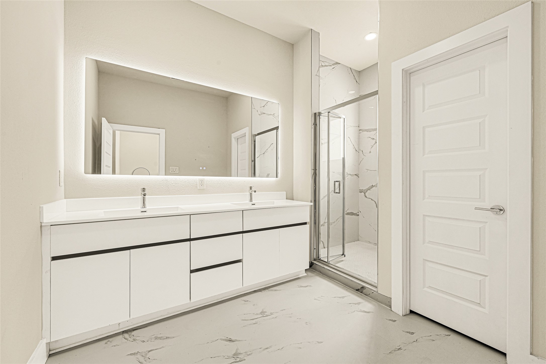 702 Savonna Houston, TX 77076 - Photo 21 of 28 a bathroom with a shower sink and mirror