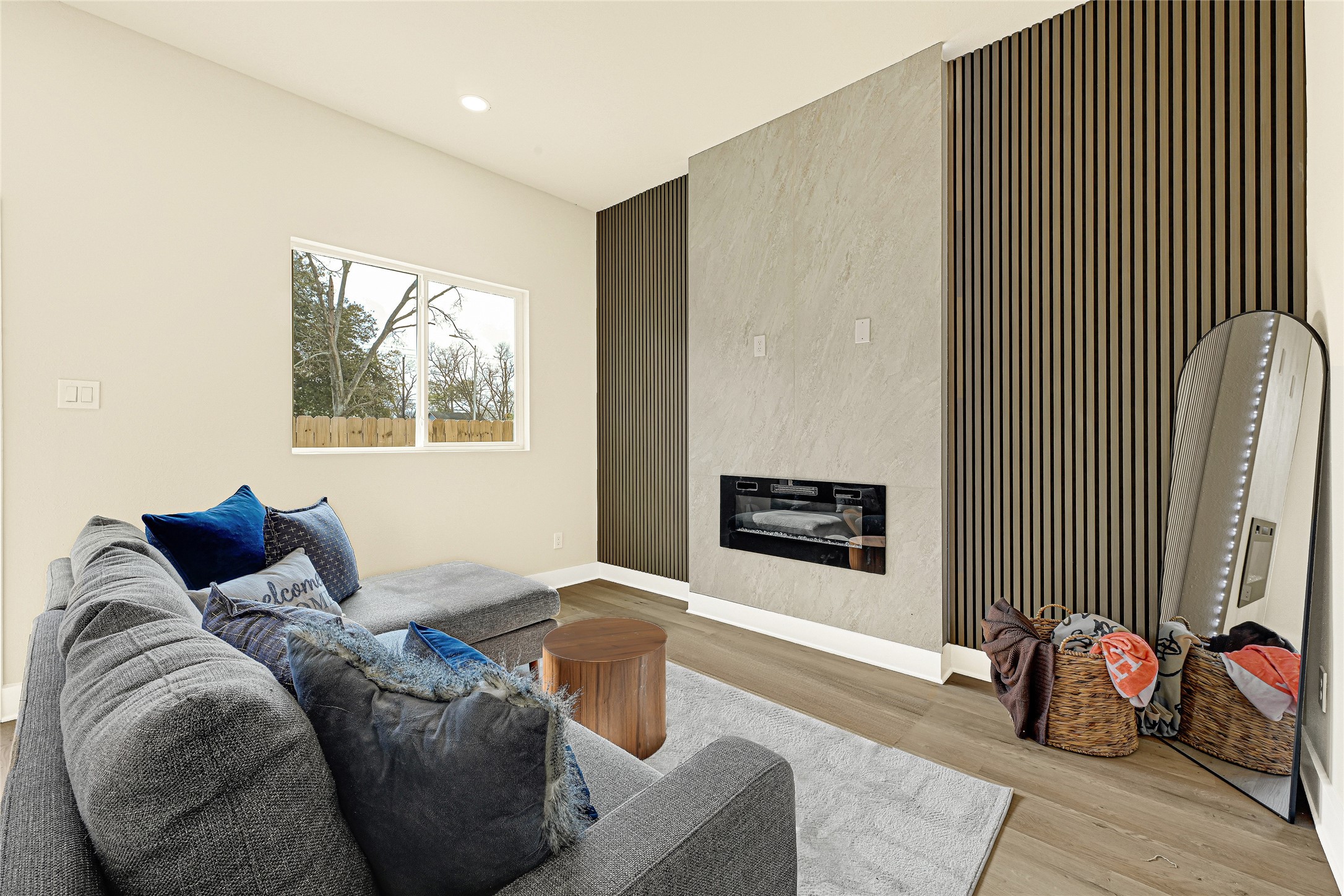 702 Savonna Houston, TX 77076 - Photo 6 of 28 a bedroom with furniture and a window