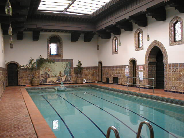 875 Sand Point Road Carpinteria, CA 93013 - Photo 12 of 12 a living room with fireplace furniture and a potted plant