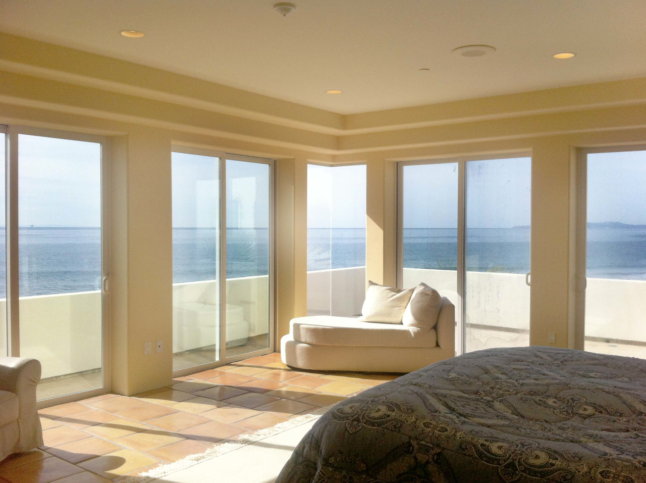 875 Sand Point Road Carpinteria, CA 93013 - Photo 5 of 12 a bedroom with two beds and large window