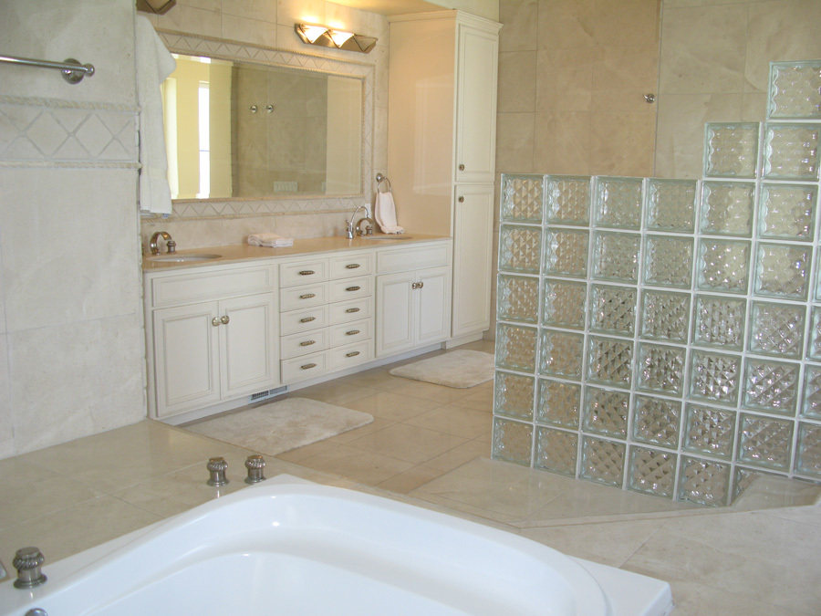 875 Sand Point Road Carpinteria, CA 93013 - Photo 6 of 12 a bathroom with a double vanity sink a mirror and a