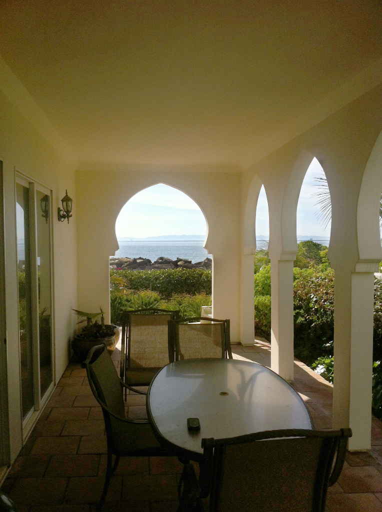 875 Sand Point Road Carpinteria, CA 93013 - Photo 8 of 12 a dining room with furniture and a window