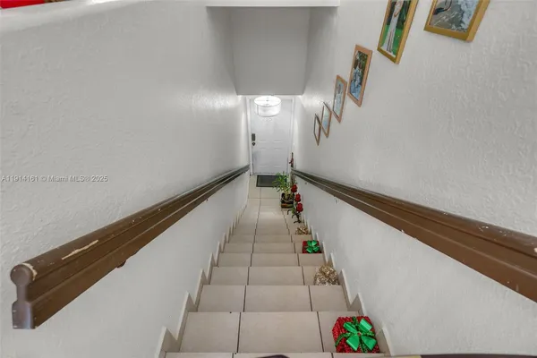 a hallway with stairs