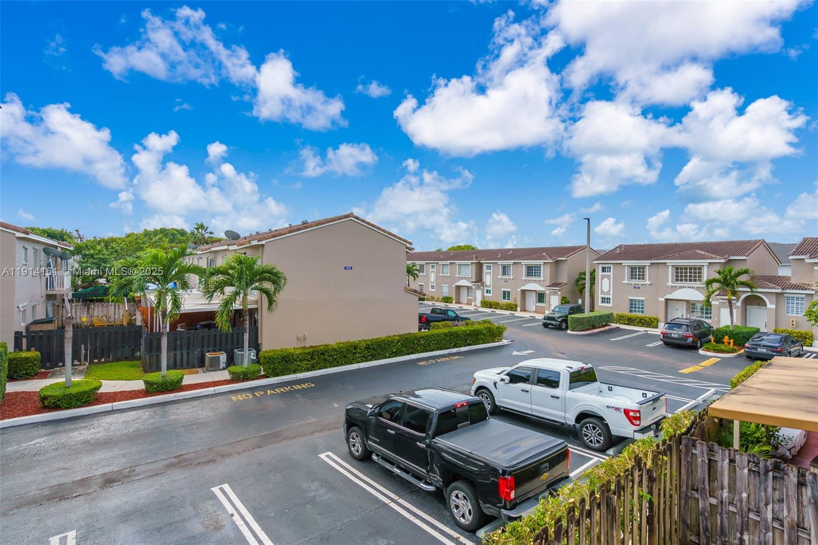 7271 Northwest 174th Terrace, Unit 202 Hialeah, FL 33015 - Photo 21 of 22 a street view with sitting space