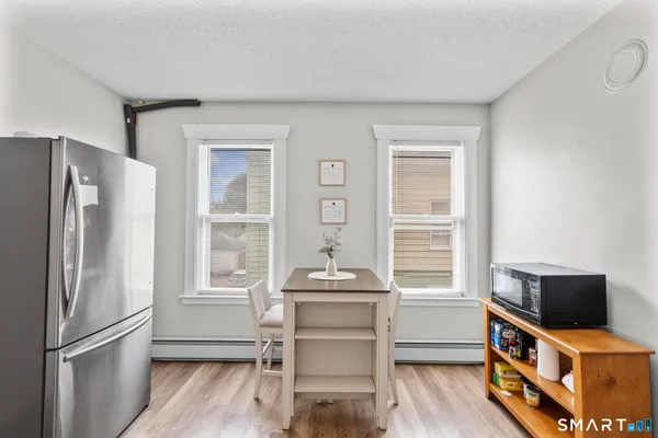 a room with furniture and a window