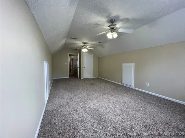 a bathroom with a sink toilet and a mirror