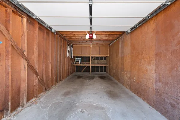 a view of a hallway with stairs