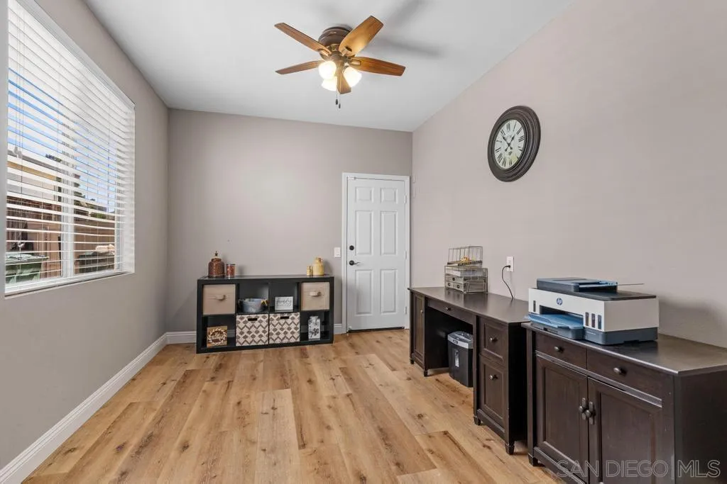 1253 Sunset Heights Road Escondido, CA 92026 - Photo 17 of 30 a view of a workspace with furniture and a window