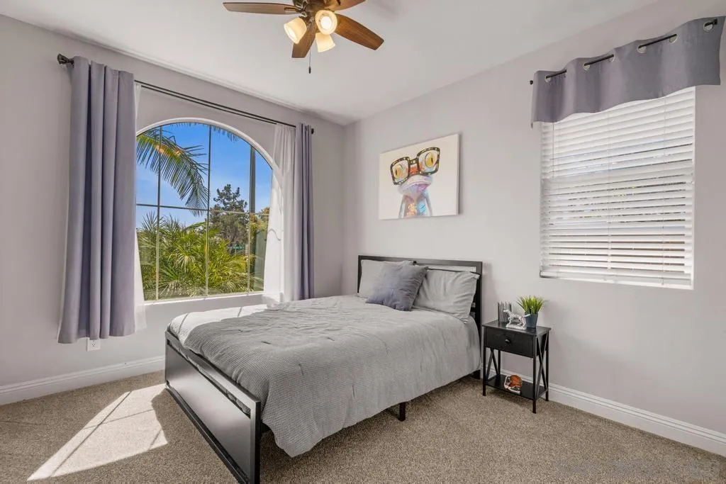 1253 Sunset Heights Road Escondido, CA 92026 - Photo 18 of 30 a bedroom with a bed and a window