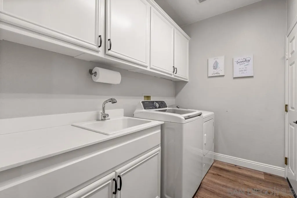 1253 Sunset Heights Road Escondido, CA 92026 - Photo 22 of 30 a utility room with dryer and washer