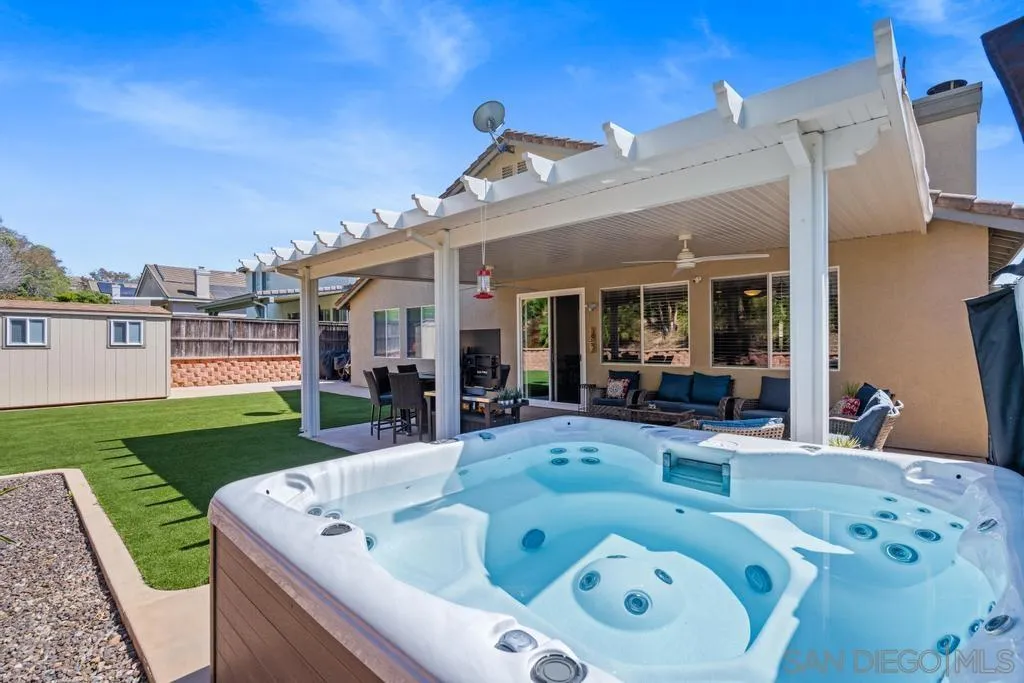 1253 Sunset Heights Road Escondido, CA 92026 - Photo 27 of 30 a view of house and outdoor space with a swimming pool