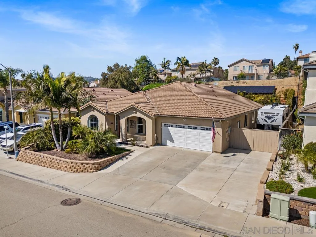 1253 Sunset Heights Road Escondido, CA 92026 - Photo 4 of 30 a aerial view of a house with a yard and potted plants