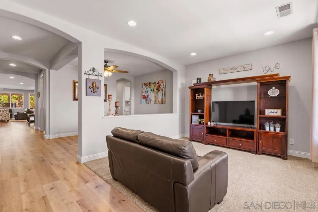 1253 Sunset Heights Road Escondido, CA 92026 - Photo 5 of 30 a living room with furniture and a flat screen tv