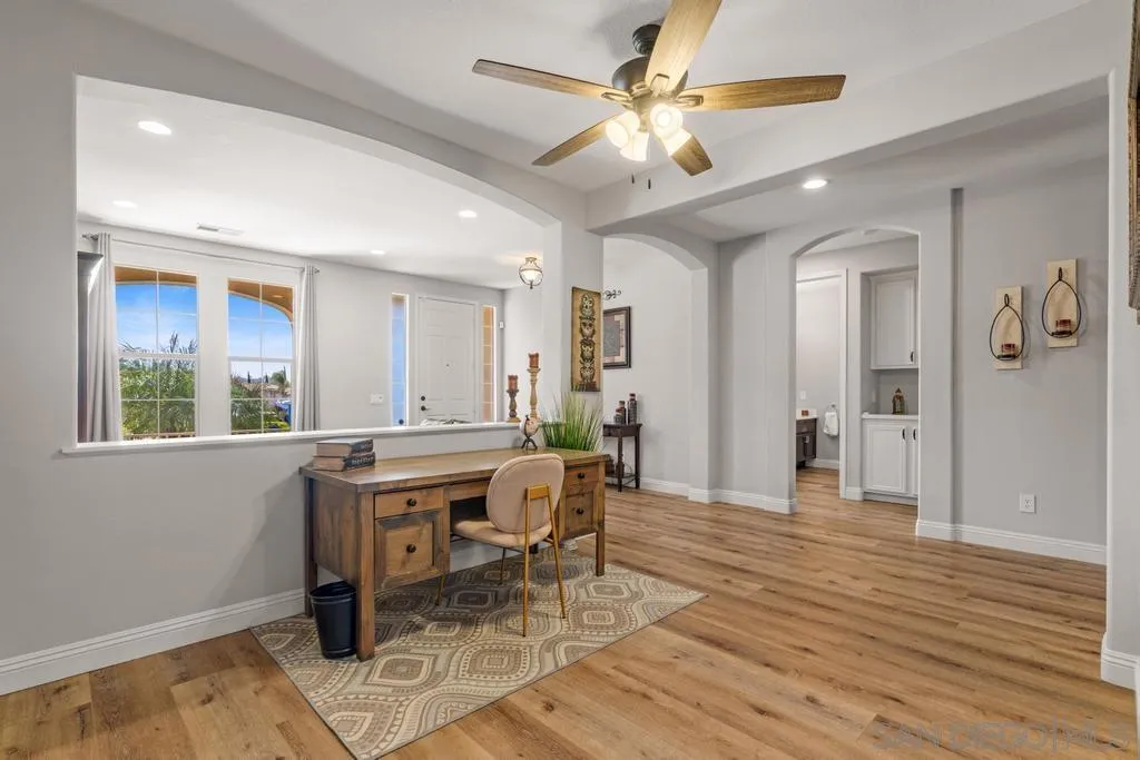 1253 Sunset Heights Road Escondido, CA 92026 - Photo 6 of 30 a view of a livingroom with furniture window and wooden floor