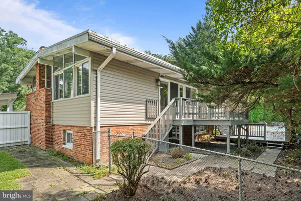 a front view of a house with parking