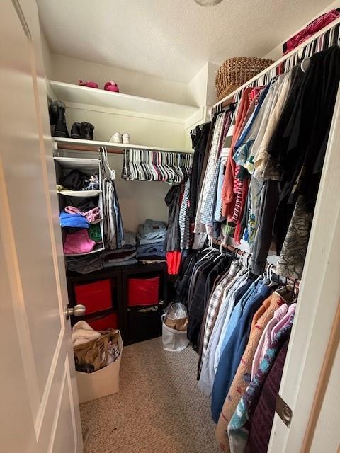 2513 South 2nd Street, Unit 3 Waco, TX 76706 - Photo 23 of 35 a view of walk in closet with clothes and shoes