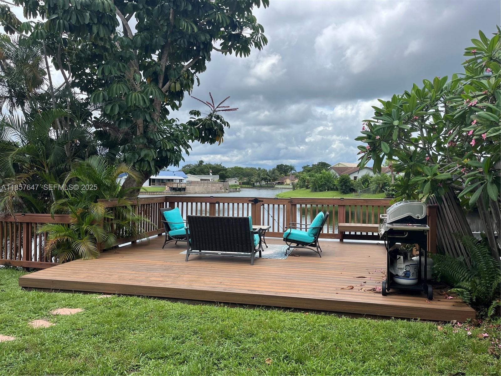 5217 Southwest 87th Avenue Cooper City, FL 33328 - Photo 5 of 8 a view of house with outdoor space and sitting area