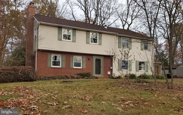 a front view of house with yard