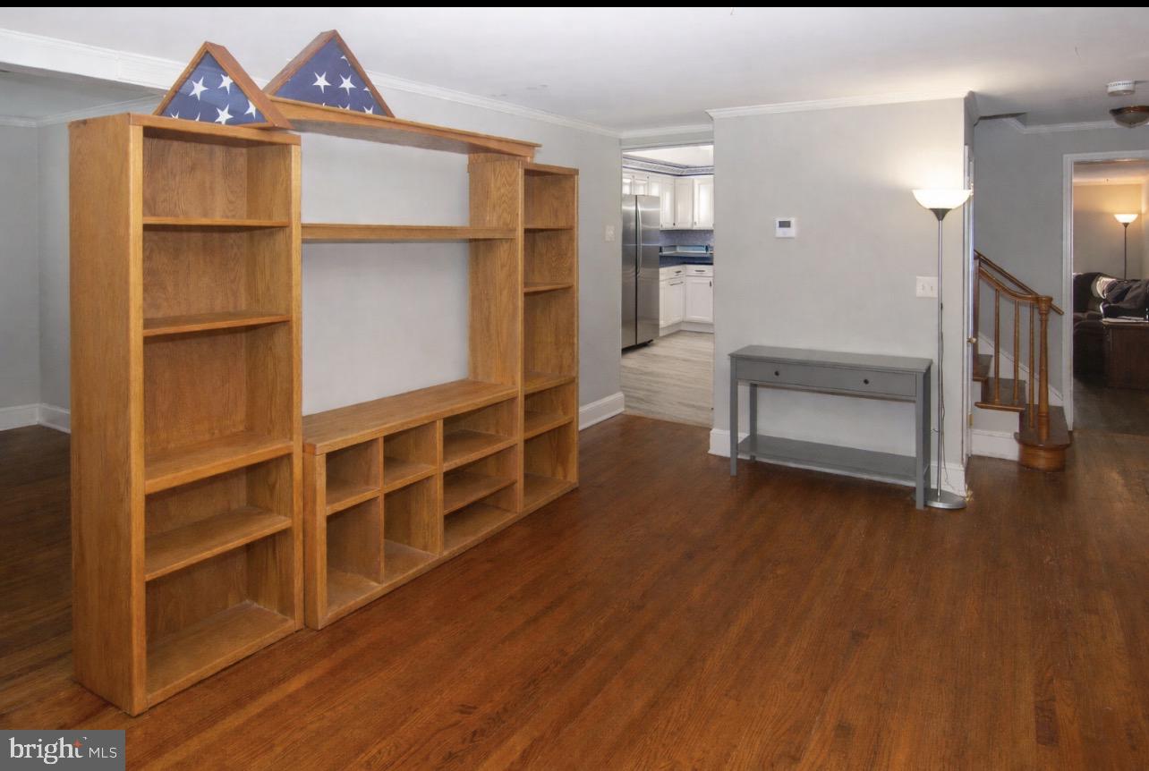2947 Potshop Road Norristown, PA 19403 - Photo 12 of 41 a view of an empty room with wooden floor and a window