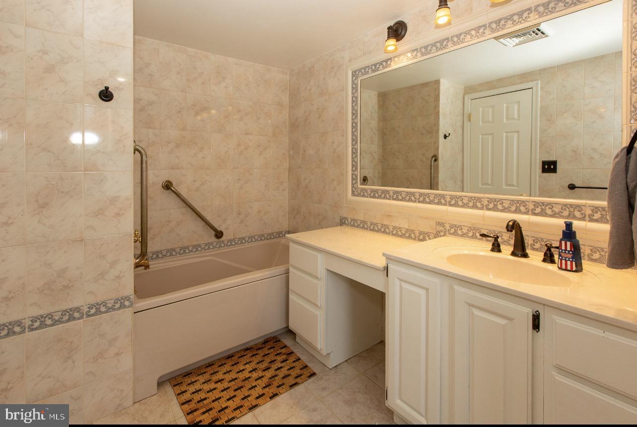 2947 Potshop Road Norristown, PA 19403 - Photo 20 of 41 a bathroom with a sink and a mirror