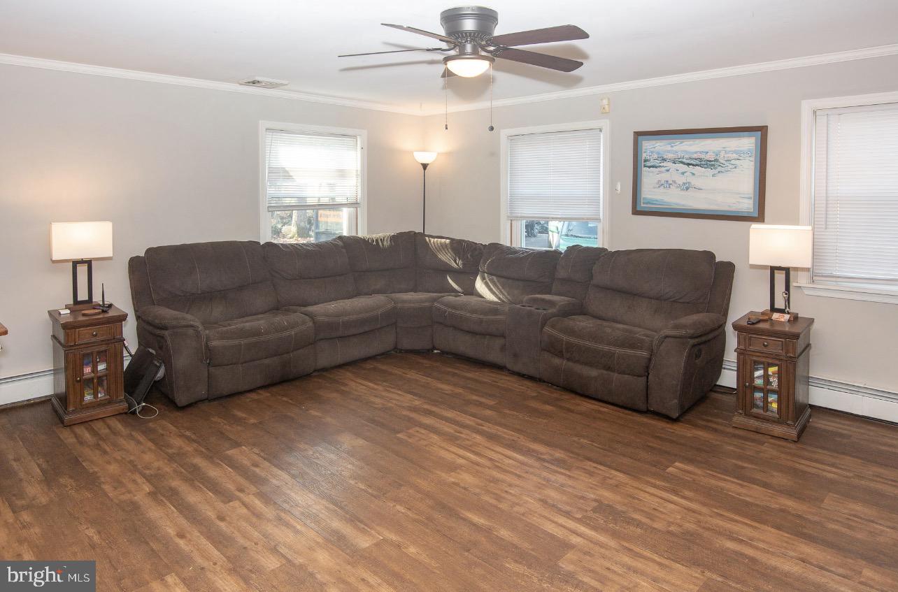 2947 Potshop Road Norristown, PA 19403 - Photo 4 of 41 a living room with furniture and a wooden floor