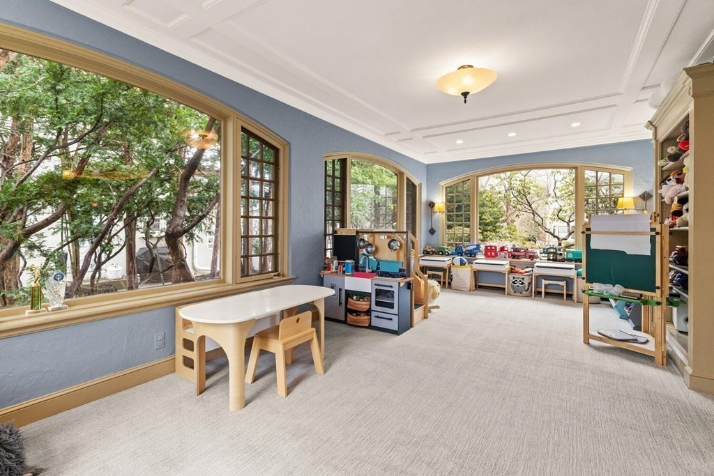 32 Everett Avenue Winchester, MA 01890 - Photo 12 of 42 a living room with furniture and a large window